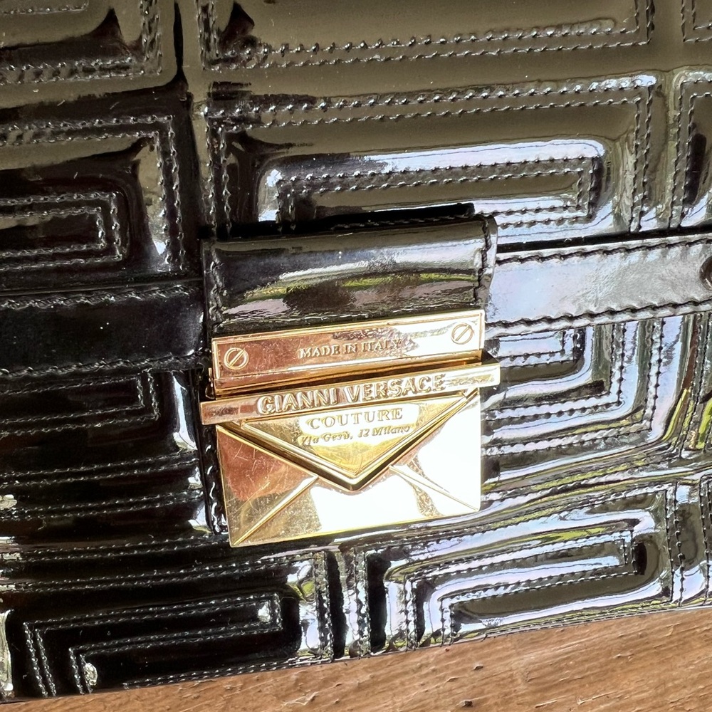 Black Versace Patent Clutch with gold metal clasp - Picture 8 of 10